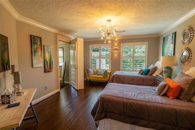 bedroom with ornamental molding, a textured ceiling, dark wood-type flooring, and a notable chandelier