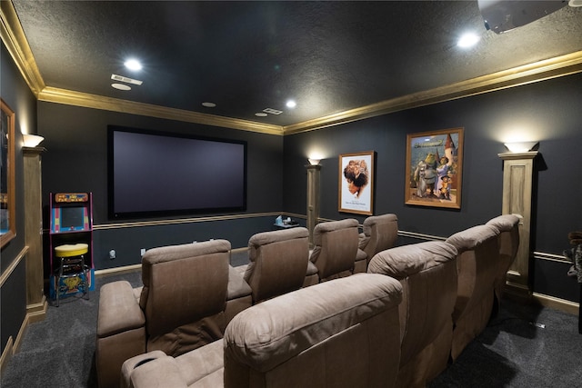 carpeted cinema room featuring ornate columns and crown molding