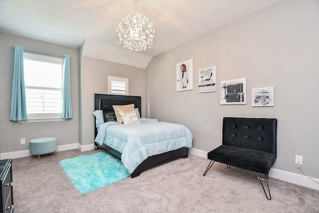 carpeted bedroom featuring lofted ceiling and a notable chandelier