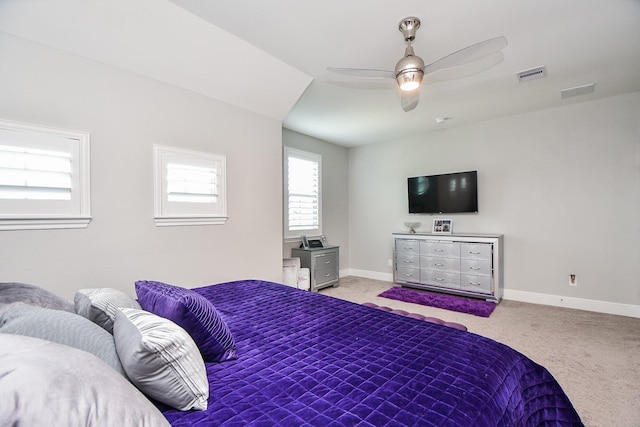 carpeted bedroom with ceiling fan