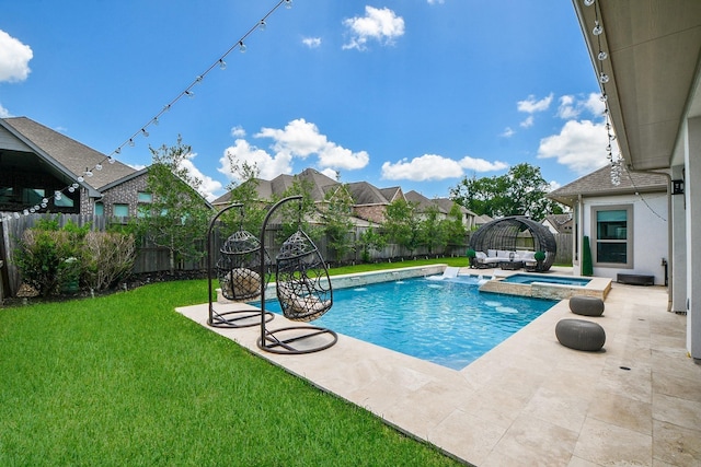 view of swimming pool with a lawn, an in ground hot tub, and a patio