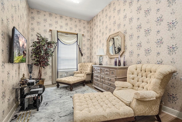 living area with hardwood / wood-style flooring