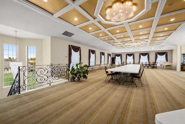 carpeted dining area with beamed ceiling and coffered ceiling