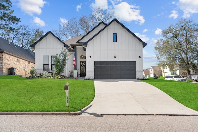 modern farmhouse featuring a garage and a front yard