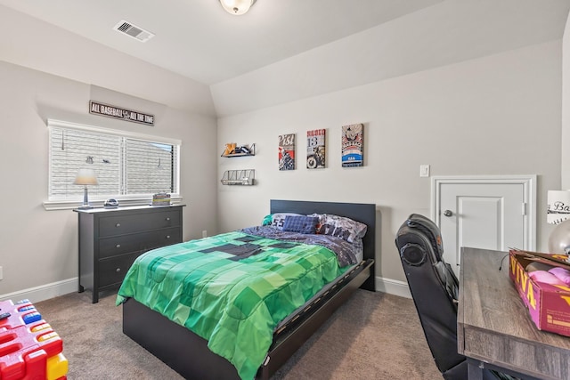 carpeted bedroom featuring vaulted ceiling