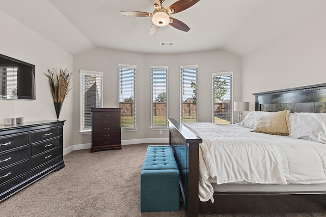 carpeted bedroom featuring ceiling fan and lofted ceiling