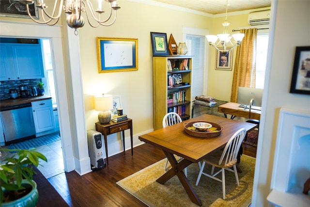 dining room with a notable chandelier, dark hardwood / wood-style flooring, an AC wall unit, and crown molding