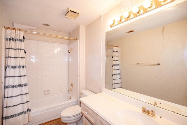 full bathroom featuring shower / tub combo with curtain, vanity, and toilet