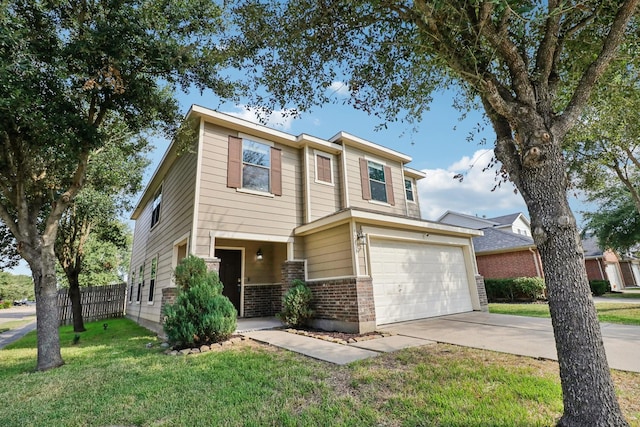 view of front of home with a garage and a front lawn