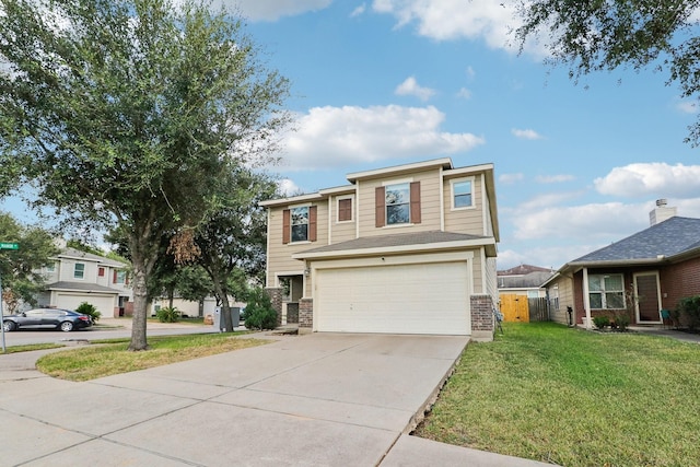 view of front of property featuring a front yard and a garage