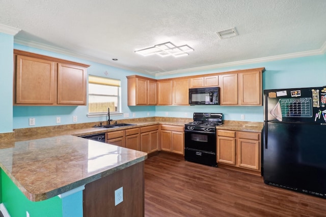 kitchen with kitchen peninsula, a textured ceiling, crown molding, sink, and black appliances