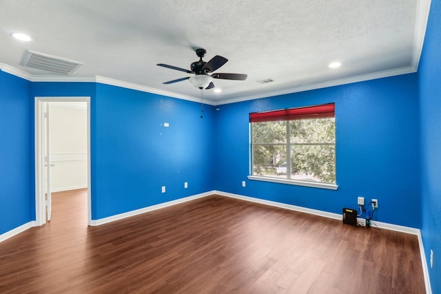 empty room featuring crown molding, ceiling fan, wood-type flooring, and a textured ceiling