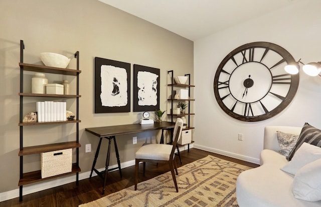 office with dark wood-type flooring