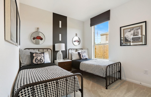 bedroom with light colored carpet