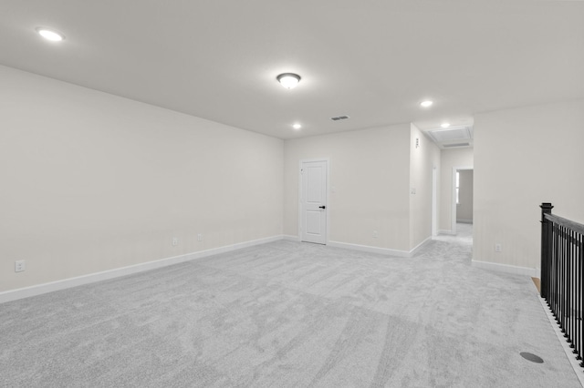 unfurnished living room with light carpet