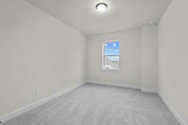 empty room with carpet flooring