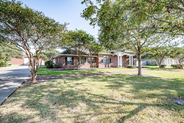 ranch-style house with a porch and a front yard