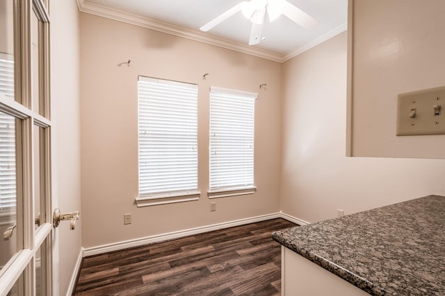 dining room featuring dark hardwood / wood-style floors, ceiling fan, and ornamental molding