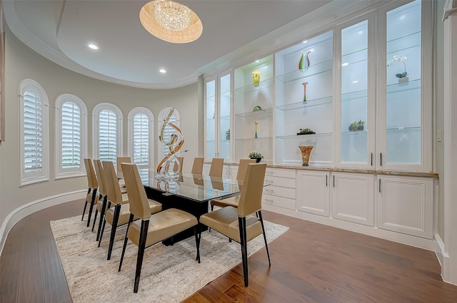 dining space featuring recessed lighting, baseboards, and dark wood-style flooring