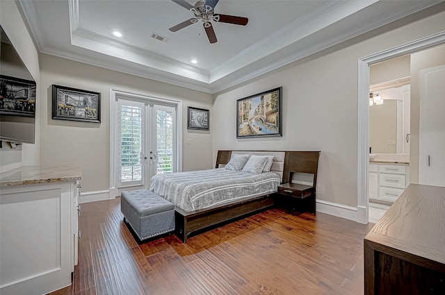 bedroom with ensuite bath, crown molding, ceiling fan, dark hardwood / wood-style flooring, and access to exterior