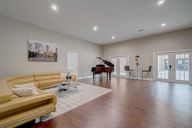 living area featuring recessed lighting, french doors, baseboards, and wood finished floors