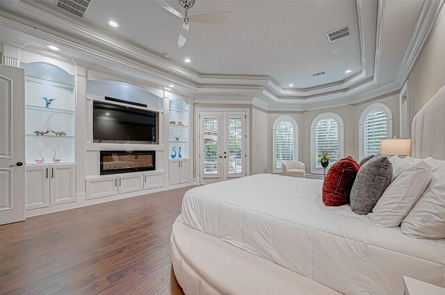 bedroom with french doors, hardwood / wood-style floors, ceiling fan, ornamental molding, and access to exterior