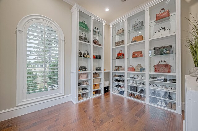 spacious closet with wood finished floors