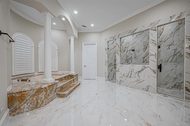 bathroom featuring decorative columns, ornamental molding, and a shower with shower door