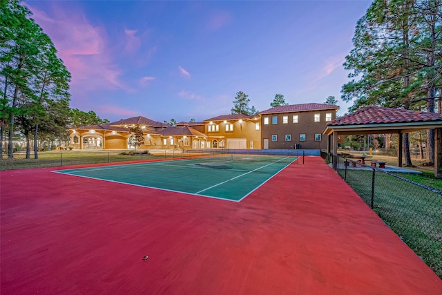 view of sport court with fence