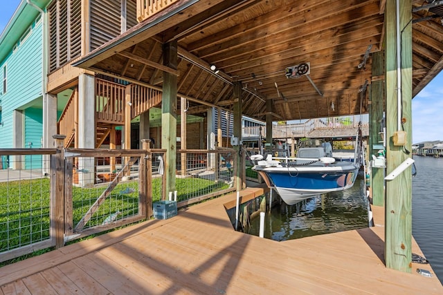 dock area with a water view