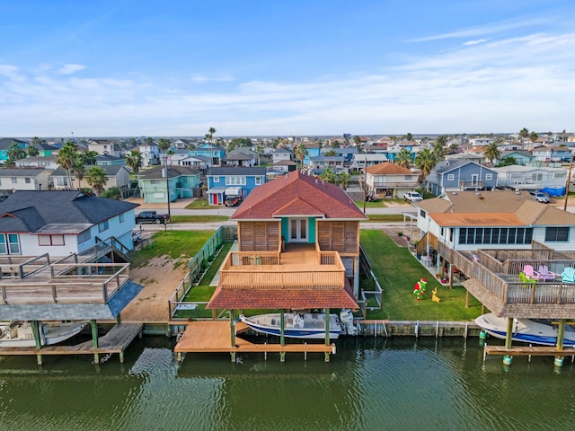 bird's eye view with a water view