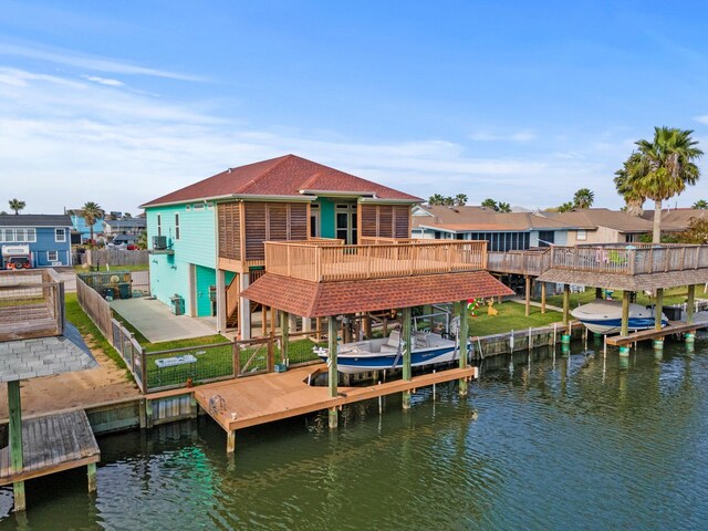 dock area with a deck with water view