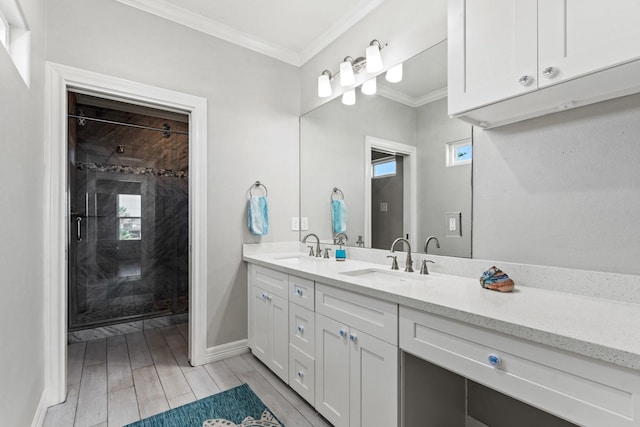 bathroom featuring vanity, walk in shower, and ornamental molding