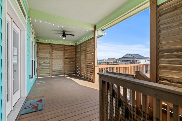 wooden deck with ceiling fan