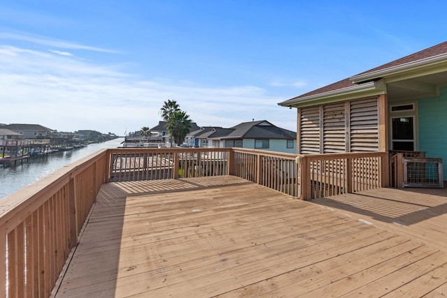 deck featuring a water view