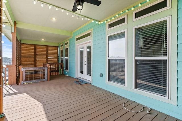 deck with ceiling fan and french doors