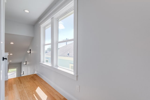 interior space with wood-type flooring and a wealth of natural light