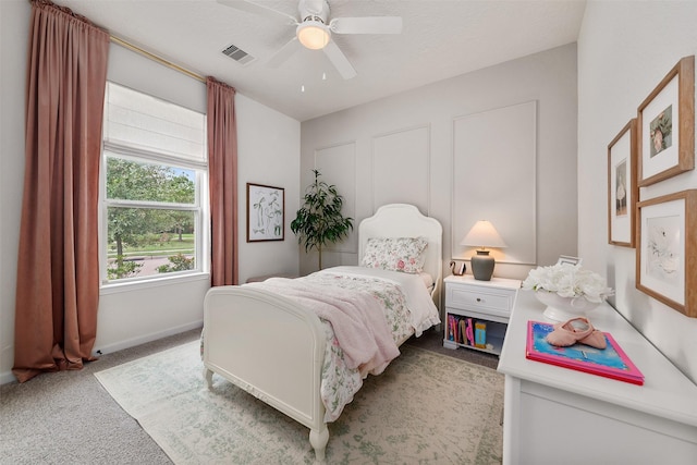 bedroom featuring ceiling fan and light colored carpet