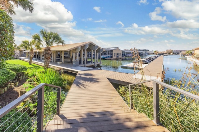 dock area with a water view