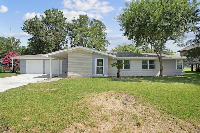 ranch-style house featuring a carport, a front yard, and a garage