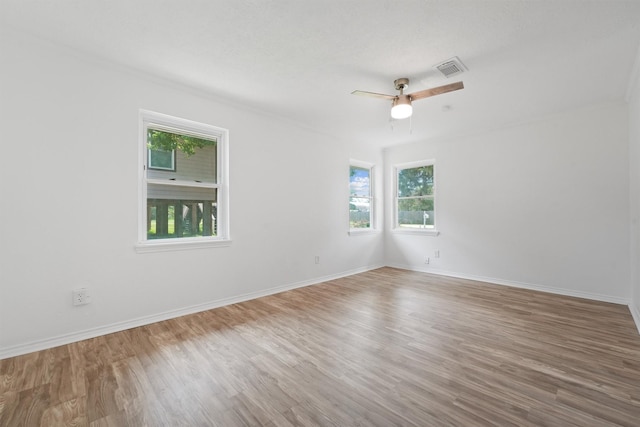 unfurnished room featuring ceiling fan and wood-type flooring