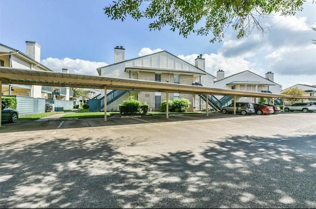 view of parking with a carport