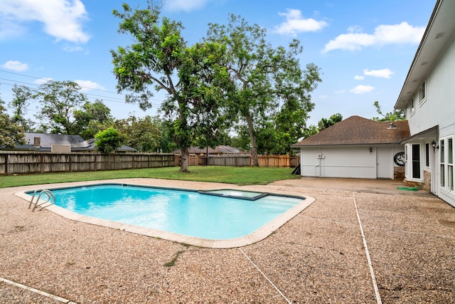 view of swimming pool with a patio area and a lawn