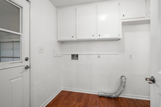 laundry area featuring hookup for a washing machine, cabinets, and dark hardwood / wood-style floors