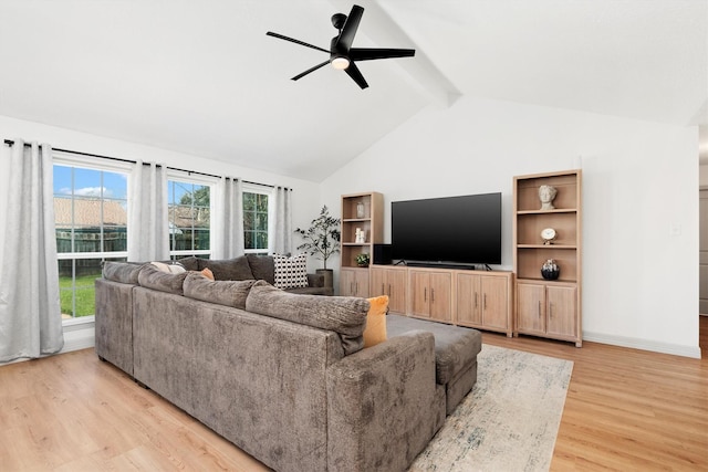 living room featuring vaulted ceiling with beams, light hardwood / wood-style floors, and ceiling fan