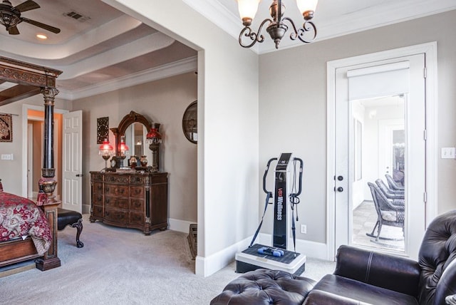 living area with crown molding, ceiling fan with notable chandelier, light colored carpet, and a tray ceiling