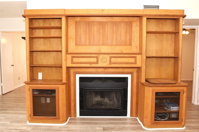 interior details featuring wood-type flooring