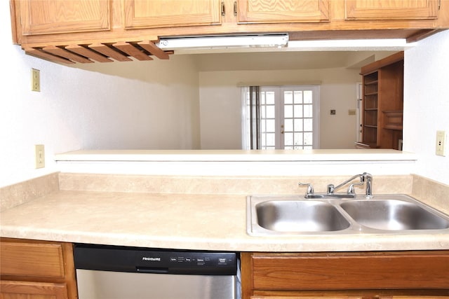 kitchen with stainless steel dishwasher and sink