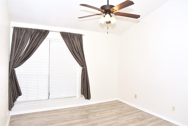 empty room featuring light hardwood / wood-style floors and ceiling fan