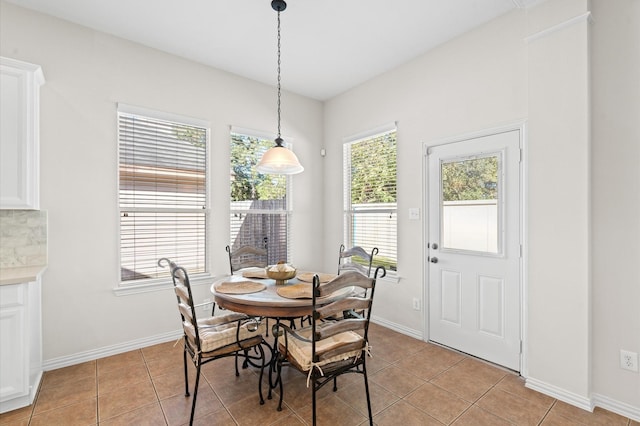 dining room featuring light tile patterned floors